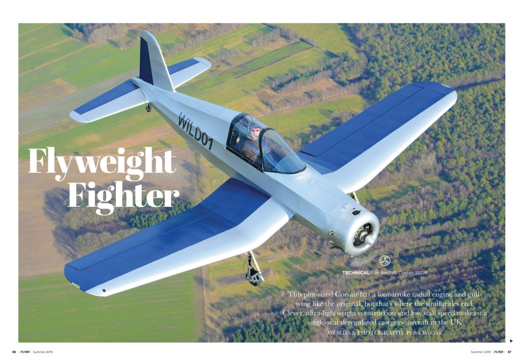 Photo looking down on the new ultralight Corsair aircraft in flight.